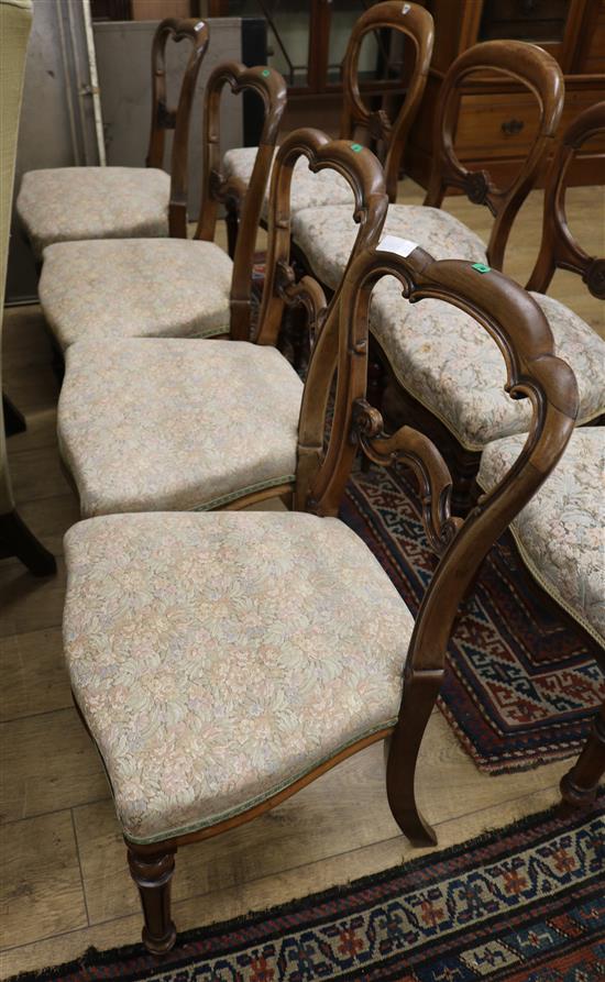 A set of four Victorian rosewood dining chairs